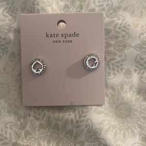 NWT Kate Spade silver spade earrings with rhinestones.